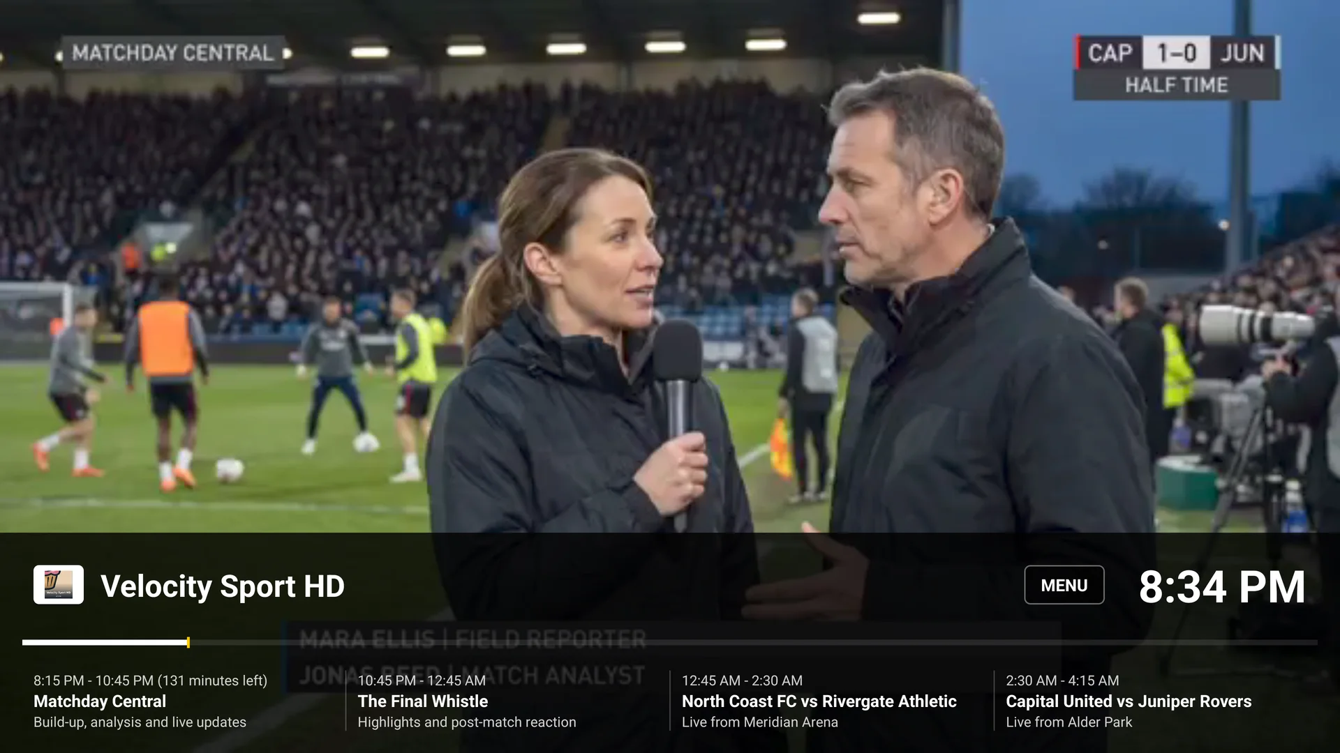 Fictional live football broadcast with visible EPG data